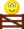 Op het hek zittende emoticon